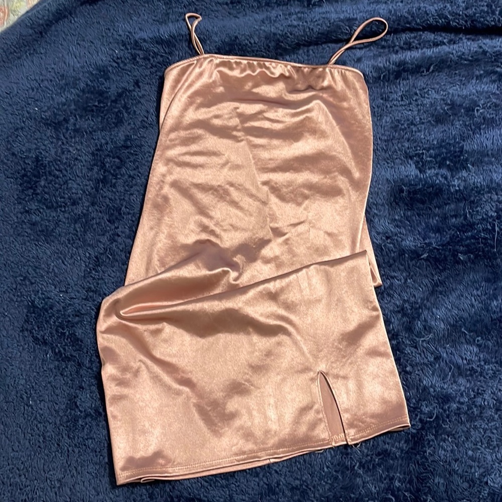 Spaghetti strap, rose colored, knee length dress.